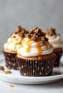 The genius of this toffee cupcake recipe lies in its simplicity and the layering of complementary flavors. The base is a classic vanilla cupcake, but we've enhanced it with brown sugar for extra moisture and a subtle caramel note. The cream cheese frosting provides a tangy contrast to the sweetness of the caramel, while the toffee pieces add that essential crunch that makes every bite interesting.