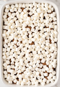 The first time I truly appreciated sweet potato casserole with marshmallows was at my grandmother's Thanksgiving table. I was maybe eight years old, and up until that point, I'd been skeptical of any vegetable that came with a topping of toasted marshmallows. It seemed too good to be true—a side dish that tasted like dessert? But one bite of that creamy, cinnamon-spiced sweet potato base topped with golden, melty marshmallows changed my mind forever. From that day forward, it became my favorite dish on the holiday table, the one I'd pile high on my plate before anything else.