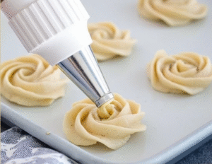 Butter cookies hold a special place in baking traditions around the world. Known as Danish butter cookies, spritz cookies, or simply butter cookies depending on the region and shape, these treats share one essential quality: they let the pure, rich flavor of butter shine through. Unlike cookies loaded with chocolate chips or frosting, butter cookies celebrate simplicity and technique.